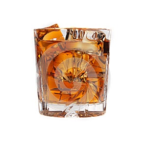 Glass of whiskey with ice isolated
