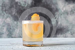 Glass of whiskey sour