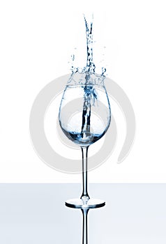 Glass of white liquid