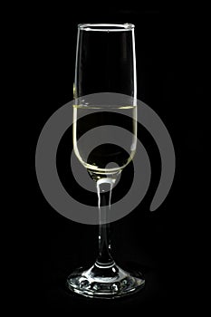 Glass of White Wine Isolated on Black
