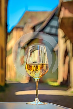 A glass of white wine at a restaurant in Riquewihr, France, Alsatian Wine Route