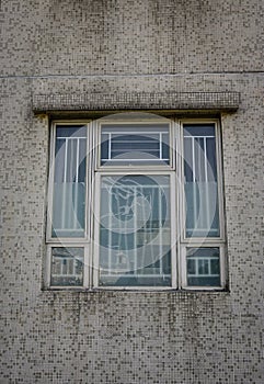 Glass window of an old apartment