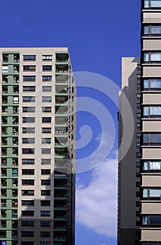 Glass windows and bulconys patterns on surface of residentcial condominiums in the city