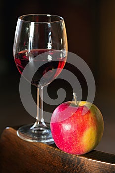 Glass of wine and an apple