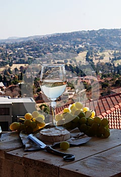 Glass wine on a background of mountains