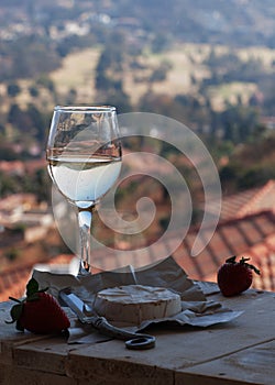 Glass wine on a background of mountains