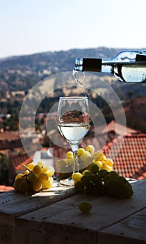 Glass wine on a background of mountains