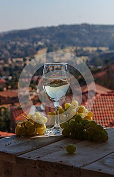 Glass wine on a background of mountains