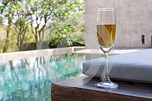 Glass of wine on the bed