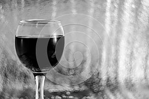 A glass of wine. Black and white image