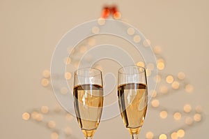 A glass of wine, champagne with envelope against bokeh background close up. Top view. New Year, Christmas mood. Greeting card