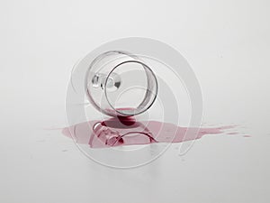 Glass wine glass overturned on a table