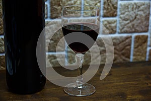 Glass of wine on wood