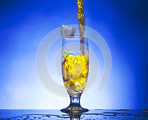 Glass withe yellow liqui