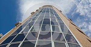 Glass and yellow brick multistory tower house