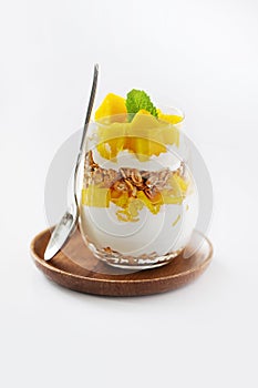 Glass with yogurt and pineapple dessert