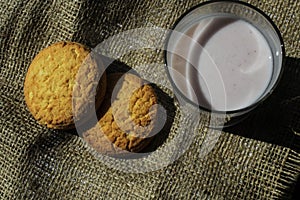 Glass of yogurt with sacking biscuits