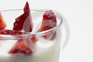 Yogurt with strawberries with copy space
