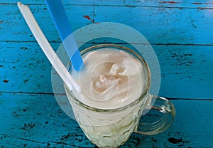 a glass of young coconut ice that refreshes and restores energy
