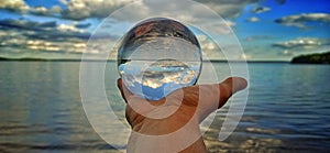 Glassball up and down sky lake