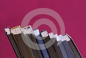 Glasses on the background of books