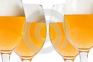Glasses of beer on a white background