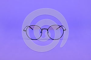 Glasses with a blue light filter to protect the eyes while working at the computer. Round glasses for filtering blue light.