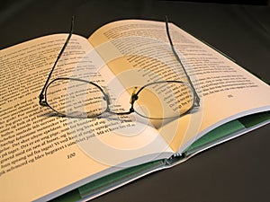 Glasses on book