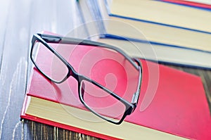 Glasses and books photo