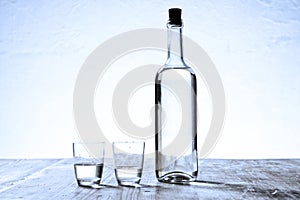 Glasses and bottle
