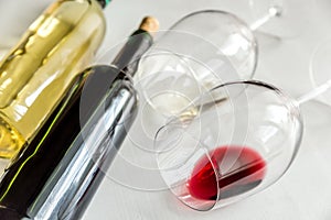 Glasses and bottles with red and white wine