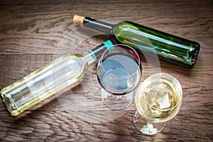 Glasses and bottles with red and white wine