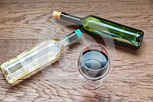 Glasses and bottles with red and white wine