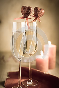 Glasses of champagne in candlelit on St Valentine's day