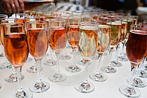 Glasses with champagne and cocktails.