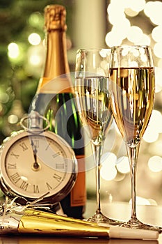 Glasses of champagne with festive background