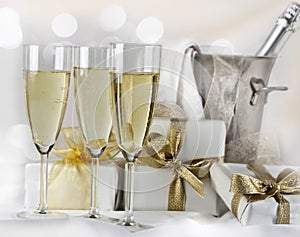 Glasses of champagne and gifts