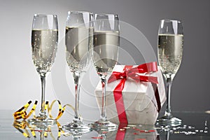 Glasses of champagne , gifts