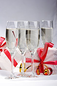 Glasses of champagne , gifts