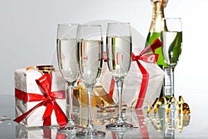 Glasses of champagne , gifts