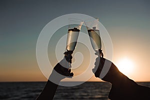 Glasses of champagne at the seaside - wedding ceremony decoration