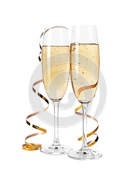 Glasses of champagne on white. Festive drink