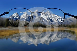 Glasses and Clear Vision of Mountains