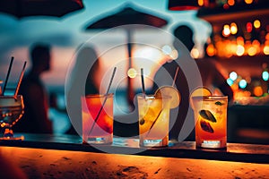 Glasses of cocktails on the table of a beach bar. Sunset, blurry people. Summer holidays travel. Generative AI.