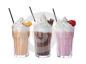 Glasses with delicious milk shakes photo