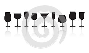 Glasses for different alcohol drinks. Black silhouettes with reflection isolated on white background. Vector