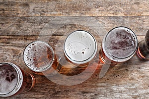 Glasses with different types of cold tasty beer
