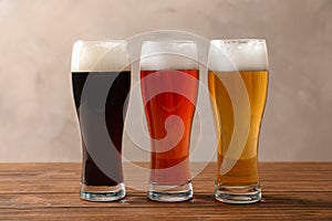 Glasses with different types of cold tasty beer