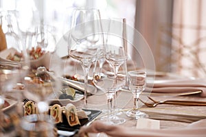 Glasses on a dinner table photo