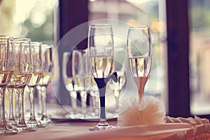 Glasses filled with campagne on wedding day